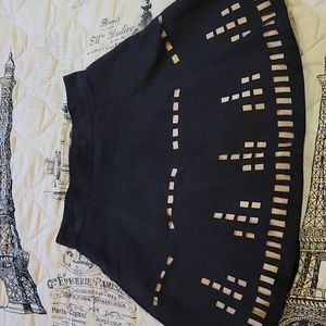 Black and nude cut out skirt